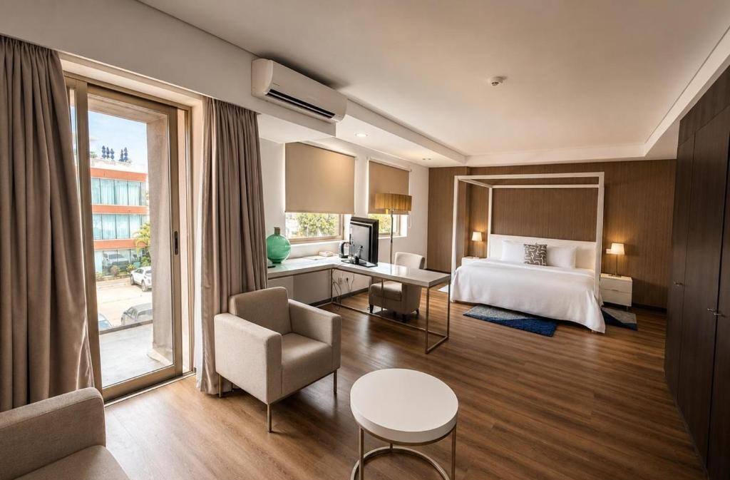 Suite with separate living area and sea view